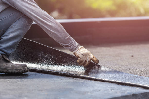 Professional Emergency Waterproofing technician working in Portland, MI